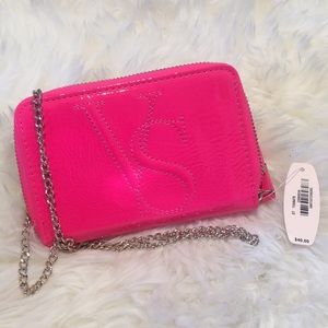 Victoria’s Secret hot pink mini crossbody wallet.